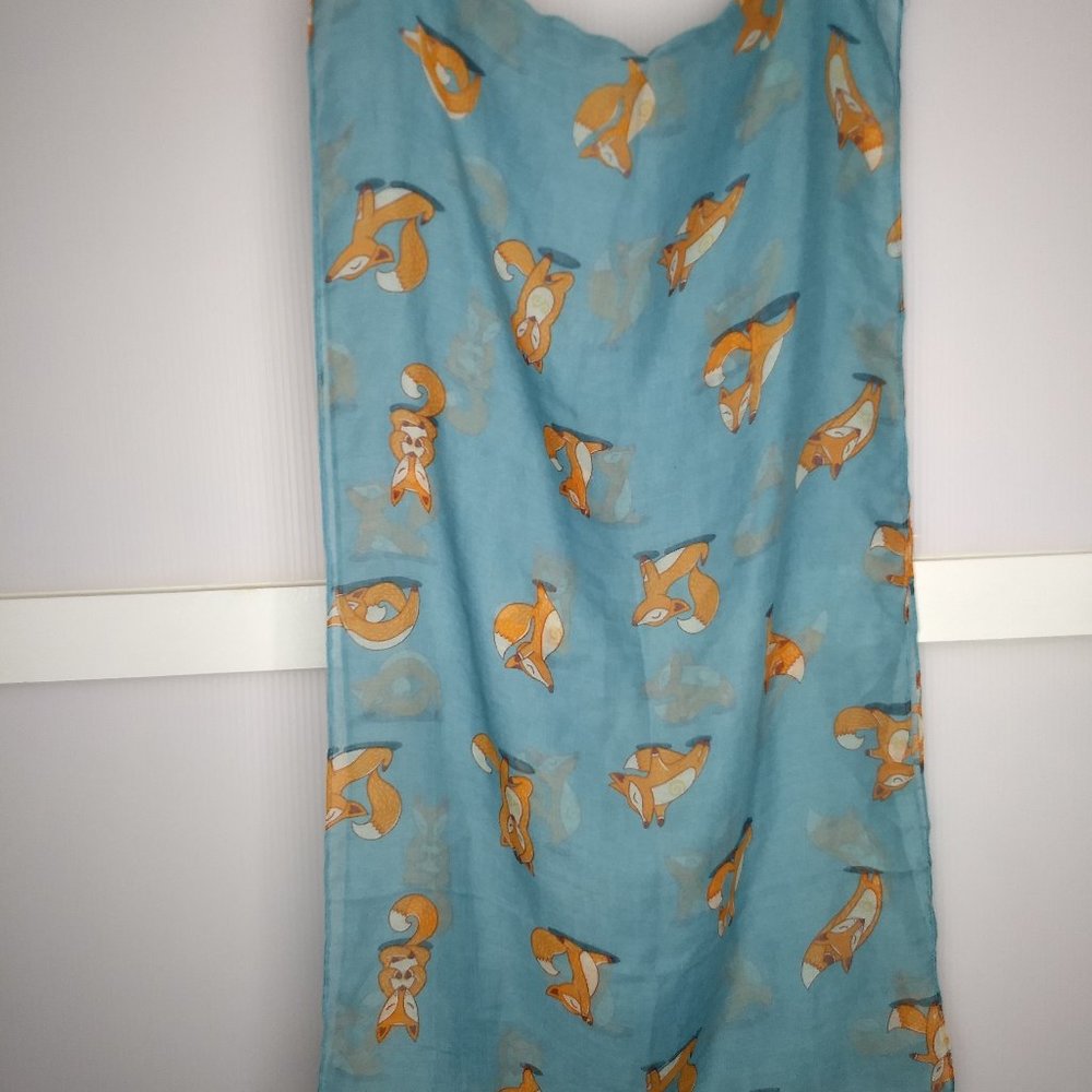 Vivian & Vincent Fox Yoga Infinity Scarf Blue background Orange Fox Yoga Poses